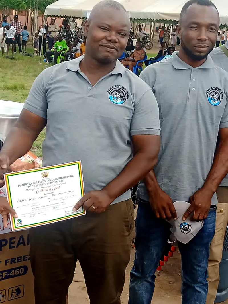 Team members holding the district award certificate