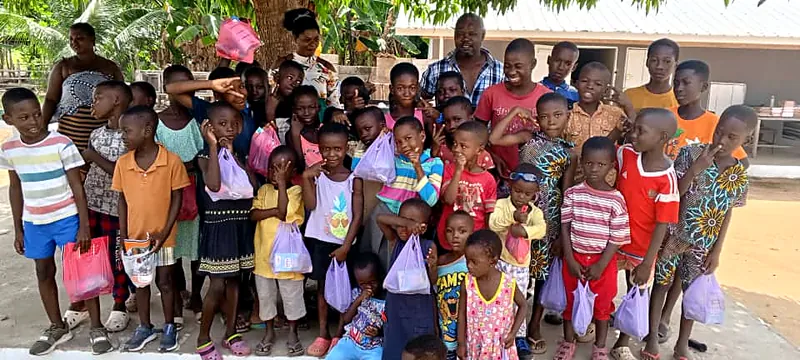 Children from the community gathered at a Best Anchor outreach event